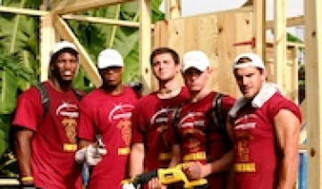 USC Team with house thumb