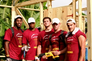 USC Team with house