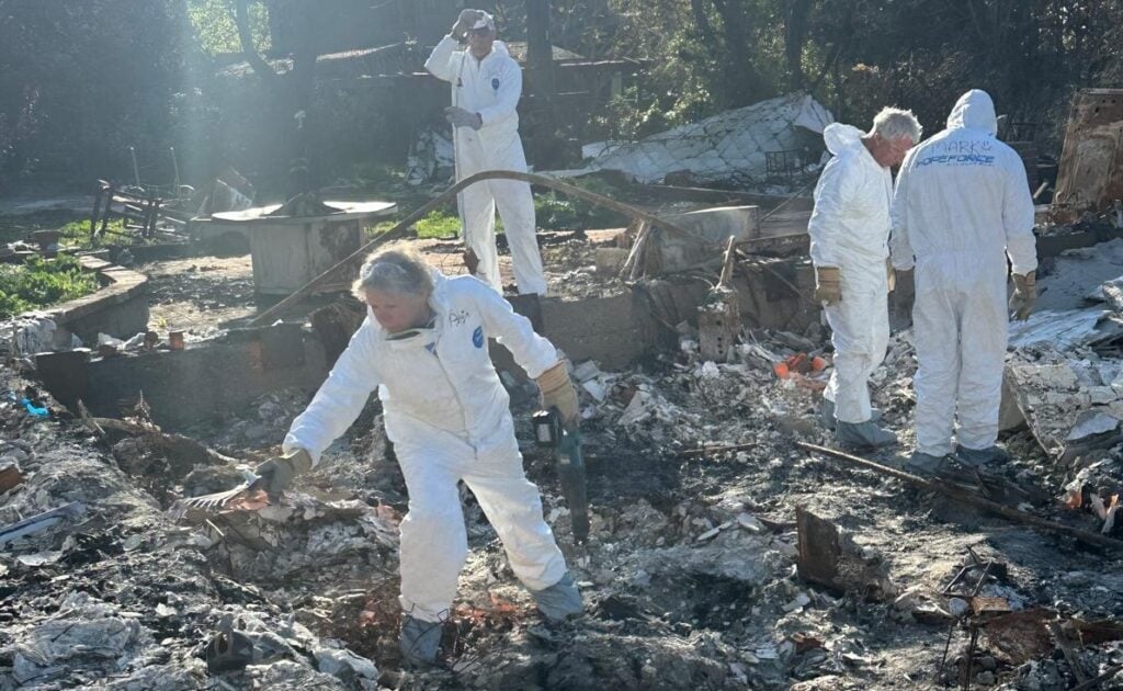 Hope Force Reservists sift through home rubble after the 2025 California wildfires.