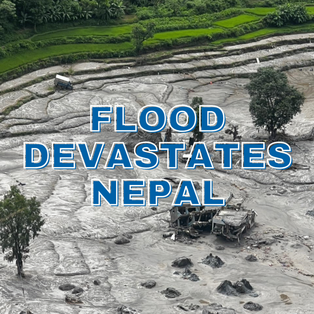 Flooded landscape in Nepal with small structure in the middle, with the text "Flood Devastates Nepal" in blue.