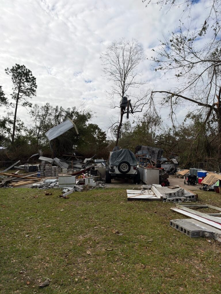 A damaged yard from Hurricane Isaias